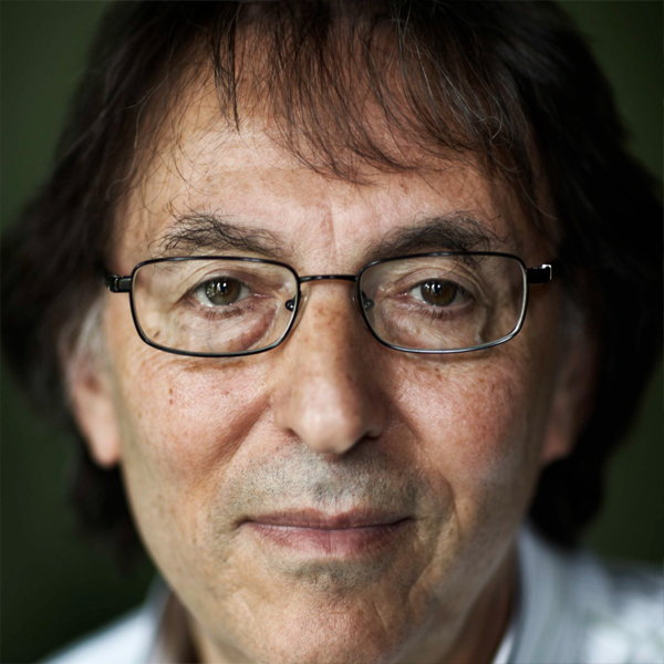 Don Black, an older man with thick black eyebrows, short black hair and thin rimmed glasses.