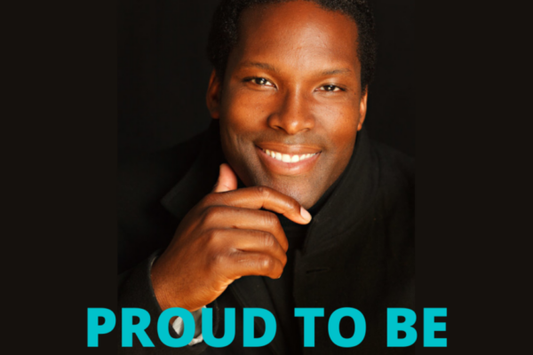 Roger Write, a black man smiling into the camera with text below which reads Proud To Be, Black History Month 2021